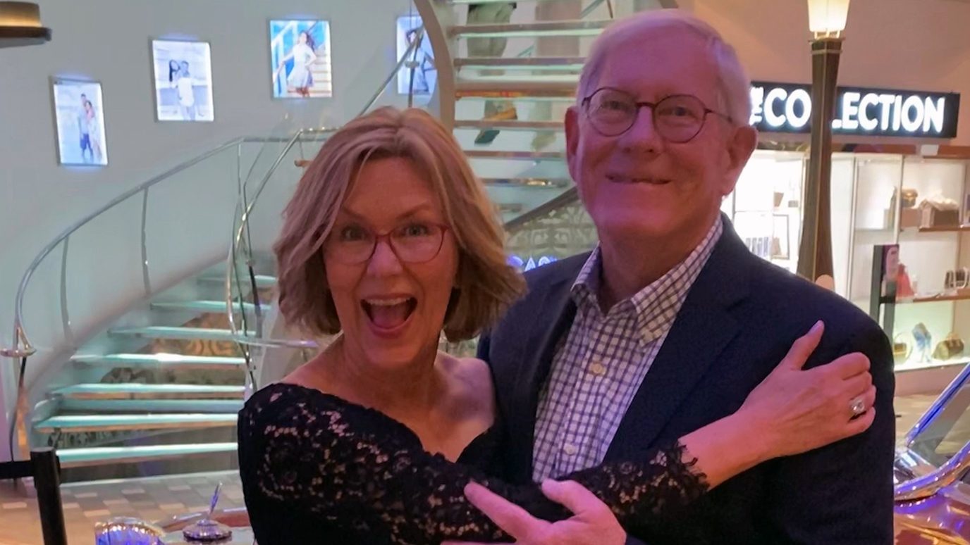 Ovarian cancer survivor Karoline Strauss embraces her husband, Robert